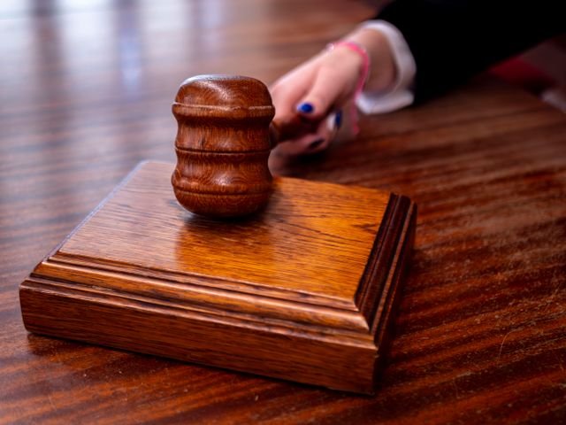 https://www.pexels.com/photo/judge-s-gavel-in-courtroom-setting-37726687/